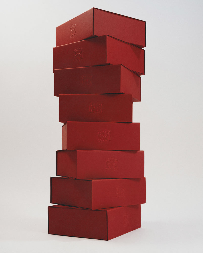 Stack of red boxes on a white background