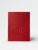 Red embossed large giftbag with a logo on a white background
